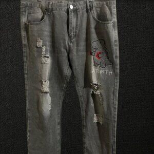 A Pair Of Men's Heavy-Duty Embellished Jeans